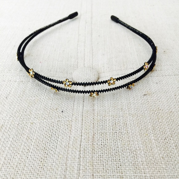 Adorable jeweled floral headband.