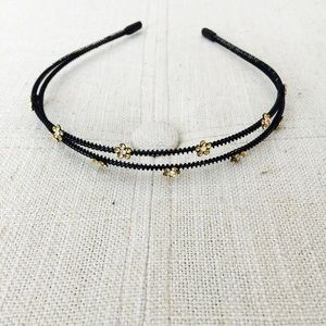 Adorable jeweled floral headband.