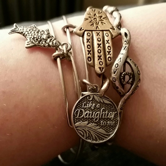 Four Alex and Ani bracelets as one lot.