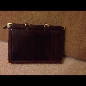 Briefcase in dark burgundy eel skin