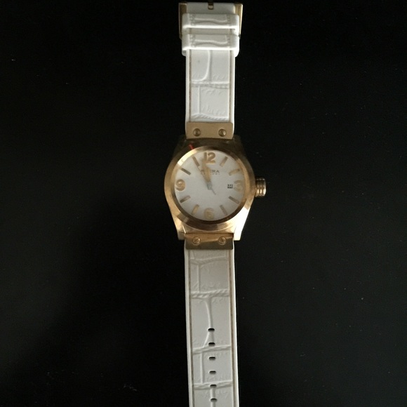 Gold face watch, white leather, couple scratches