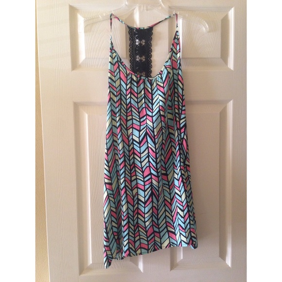 Bright patterned dress with lace back.