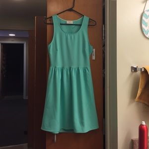 Mint green open-back scalloped dress with tags
