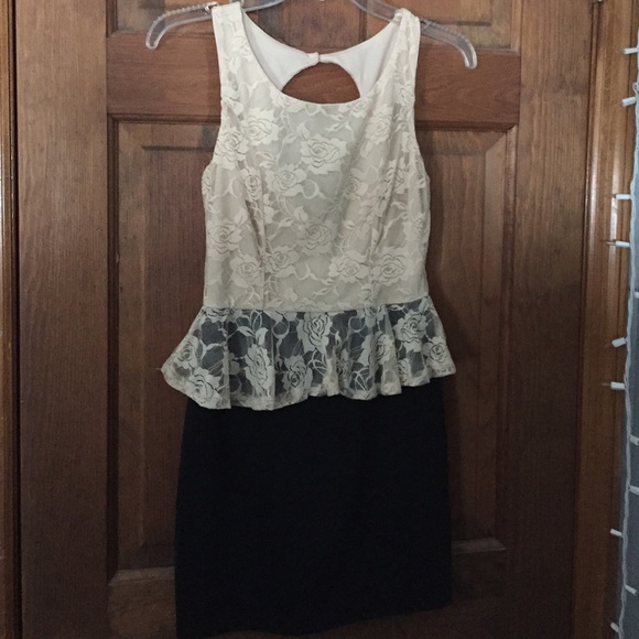 Nude & black peplum dress