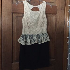 Nude & black peplum dress