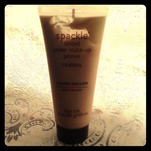 Spackle tinted under make-up primer in ethereal