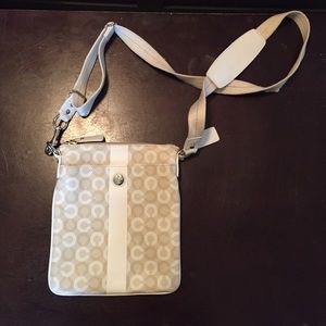 White and cream Coach tote.