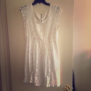 White lace short sleeved dress.