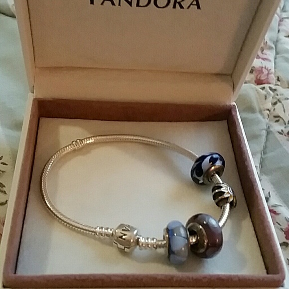 Pandora bracelet and 4 beads