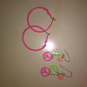 Neon pink hoops and neon peace earrings