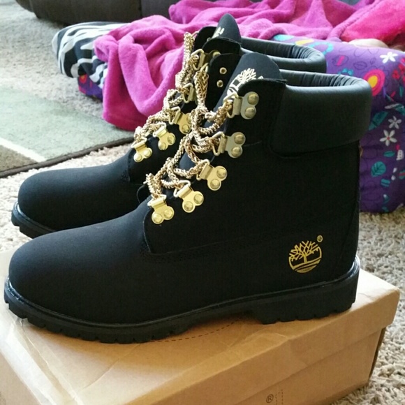 Black timberlands with chains