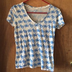 Small v-neck top with blue bicycle print