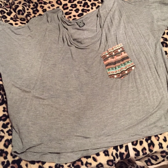 Dark grey top with Aztec designed pocket