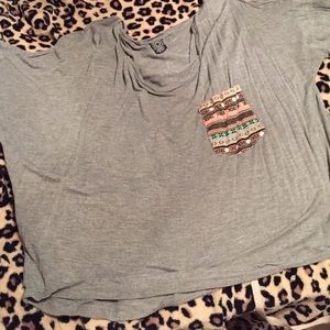 Dark grey top with Aztec designed pocket