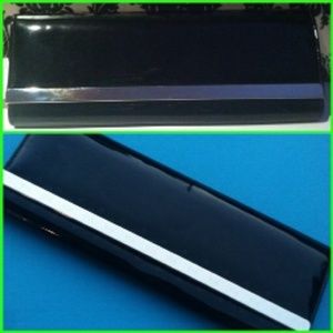 Black patent leather with silver accent clutch