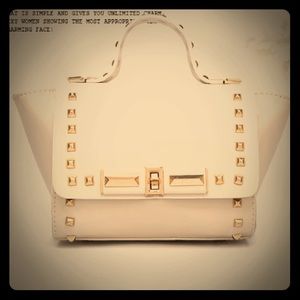 Studded handbag Valenino style