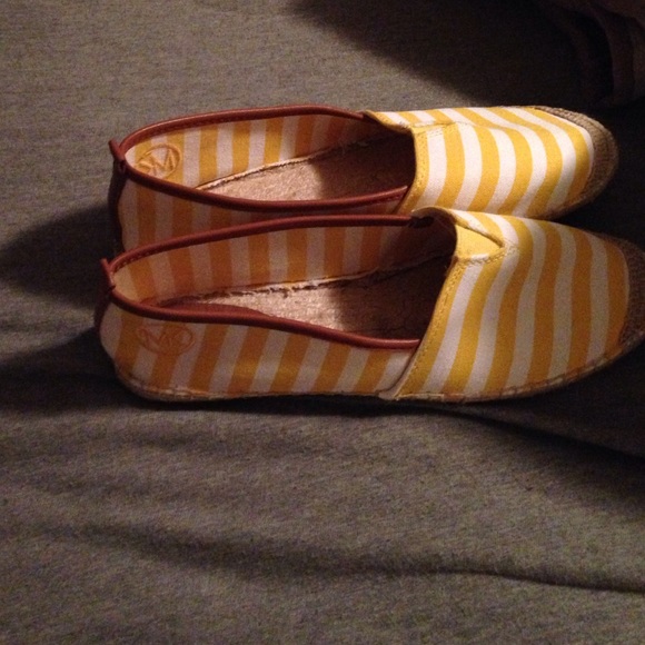A pair of Michael Kors shoes size 11