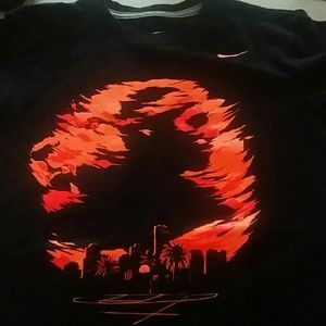 Nike boys youth large.  Nike better world.