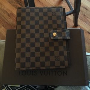 Louis Vuitton large day planner.
