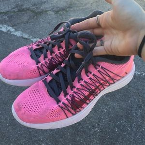 Pink nike road racing/workout shoes