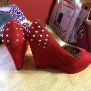 Red studded wedge heels