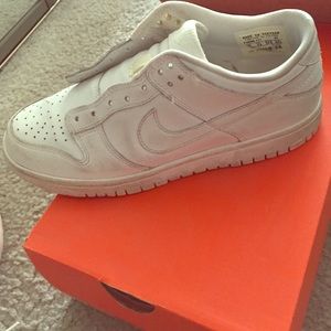All white Nike Dunk low. Worn 2 times