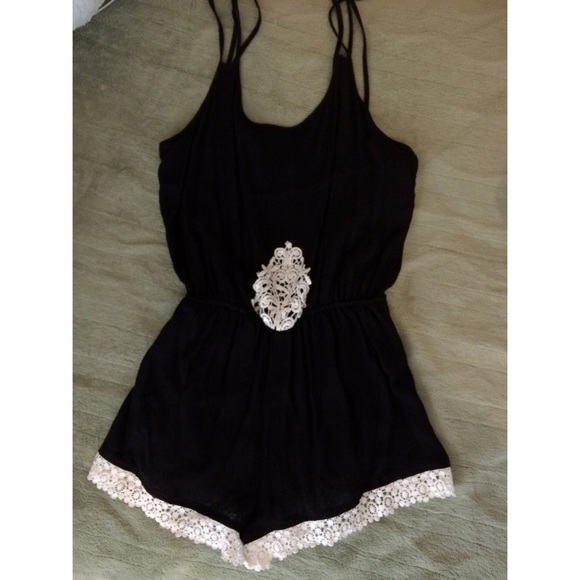 Black crochet romper.