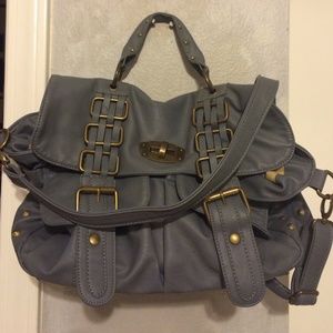 Periwinkle purse with gold stud accents