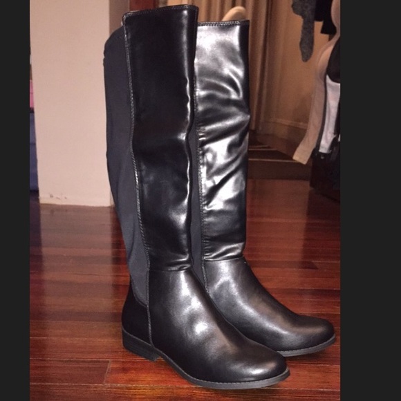 Black leather and stretch material black boots