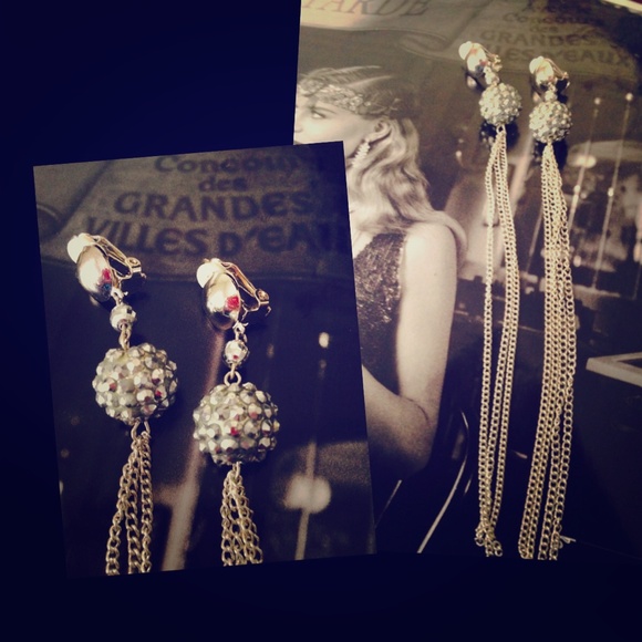 Mirror ball tassel earrings.