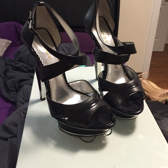 Bebe black with silver heels