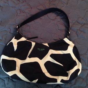 Kate Spade black and cream cloth patterned bag.