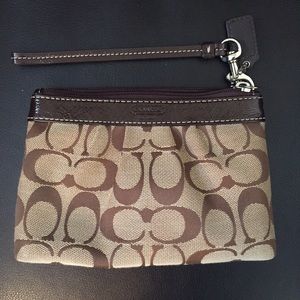 Brown COACH wristlet