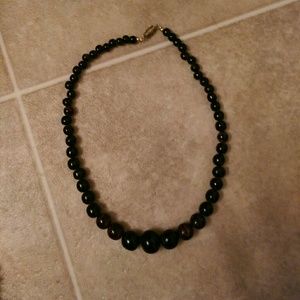 Free gift. Brown and black swirl beaded necklace