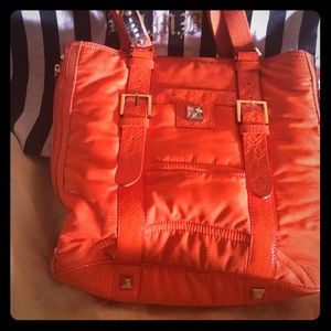 L.A.M.B orange handbag