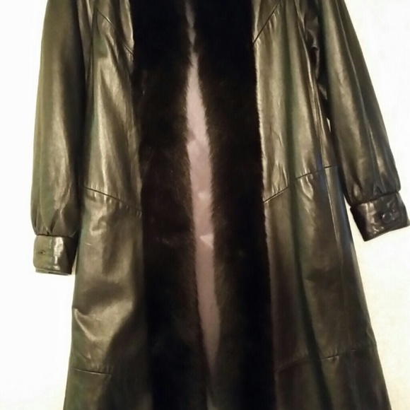 Discounted 25% off .Leather Coat, trimmed  in Fur.