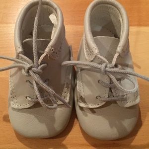 Jacardi light blue infant shoes.
