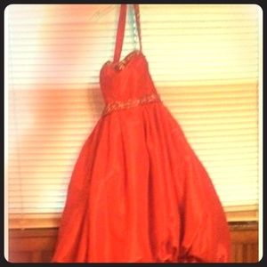 I am selling a kiss kiss formal dress never worn