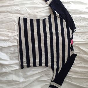 Navy striped shirt.