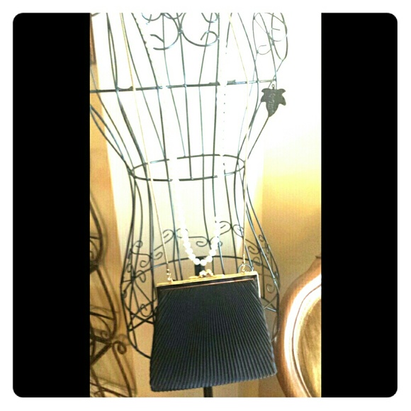 Just like new Black slinky cocktail purse.