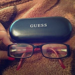 Black Guess prescription glasses.
