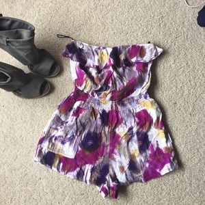 Romper with ruffle top and pockets.