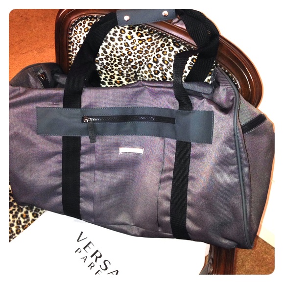 SOLD 
Versace Grey carryon bag for his or hers. NWOT