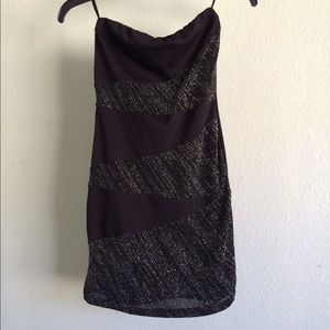 Black strapless dress with a zig-zag silver detail