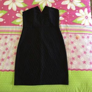 Black strapless dress with a Vshaped chest opening