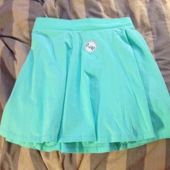 Teal Victoria's Secret pink skirt