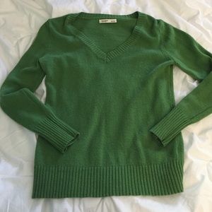 Green V-neck sweater