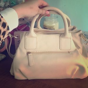 Beige purse with crossbody strap