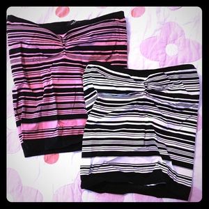 Two Bebe crop tops.
