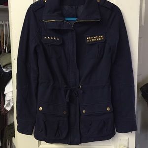 HOLD. Navy jacket with gold studs